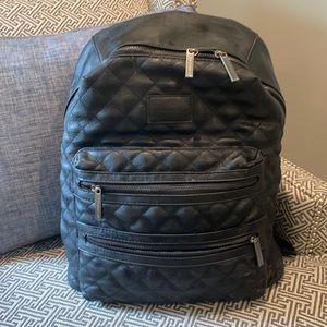 The Honest Co. brand “City” black leather backpack